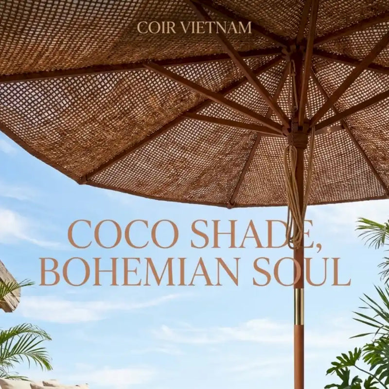 Large patio Coco Umbrella with woven coconut coir canopy creating rustic bohemian shade over an outdoor dining area