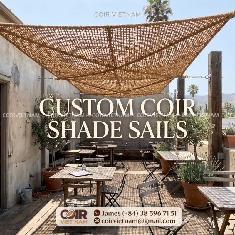 Custom coir shade sails creating natural breathable shade above an outdoor cafe and hospitality seating area